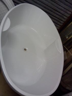 large oval build in tile in bath thin rim
