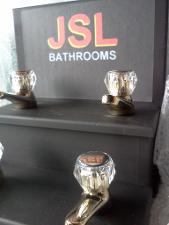 gold bath and basin taps bathroom