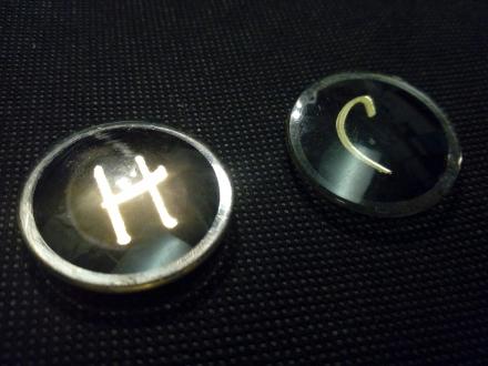 h and c golden black plastic tap caps