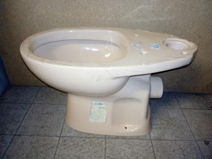 peach colour close coupled toilet pan